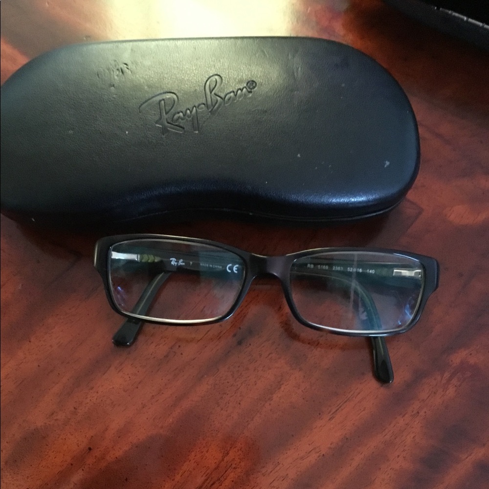 Ray Ban Black RX eyeglasses  RB5169 2383 5016- 140. $70